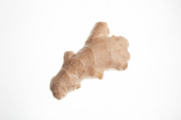 Whole ginger root isolated on white background