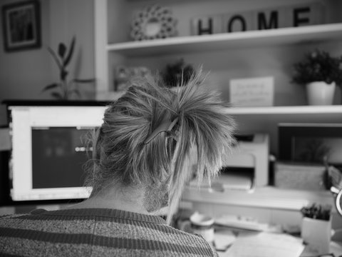 Head Shot Of A High School Teacher Working Lessons From Home During The Coronavirus Covid-19 Lockdown Of Society