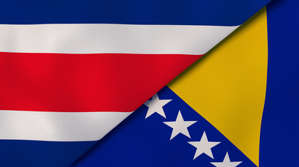 The flags of Costa Rica and Bosnia and Herzegovina. News, reportage, business background. 3d illustration - obrazy, fototapety, plakaty