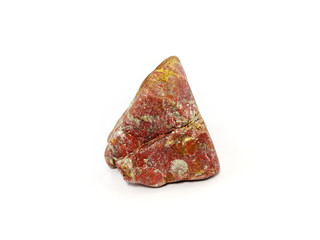 Jasper rock on white background. red stone, Jasper stone is an aggregate mineral commonly used in...