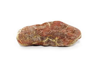 Jasper rock on white background. red stone, Jasper stone is an aggregate mineral commonly used in...