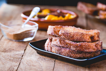Typical Spanish food at the Easter festivities Torrijas whit sugar.