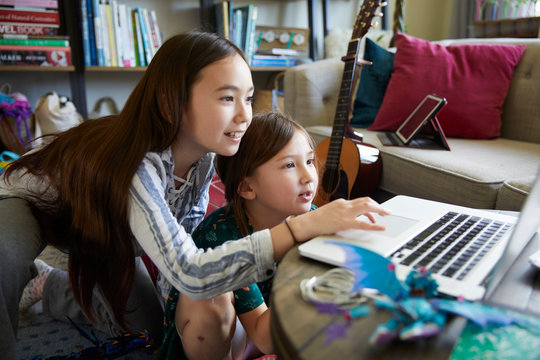 Kids e-learning at home during coronavirus COVID-19 restrictions and closed schools