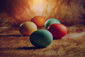 Easter eggs on a vintage background with divorces