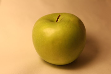 Fresh green apple on background