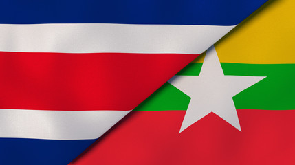 The flags of Costa Rica and Myanmar. News, reportage, business background. 3d illustration