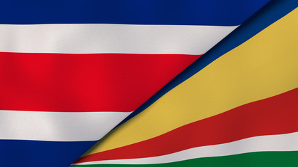 The flags of Costa Rica and Seychelles. News, reportage, business background. 3d illustration