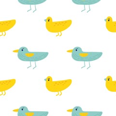 Seamless pattern of colorful birds. Blue and yellow cartoon birds.Suitable for wrapping paper and bedding.