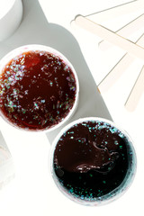 Sugaring, sugar depilation concept, body care. Texture of honey paste to remove hair.