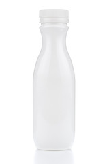 White plastic milk bottle isolated on white background with reflection on glossy surface