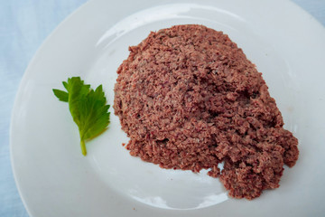 Tinned tuna steak removed from can.