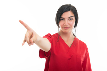 Portrait of young attractive female nurse making denial gesture