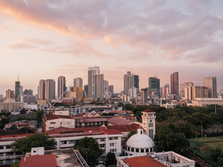 Naklejka premium Skyline of Binondo District in Metro Manila while sunset
