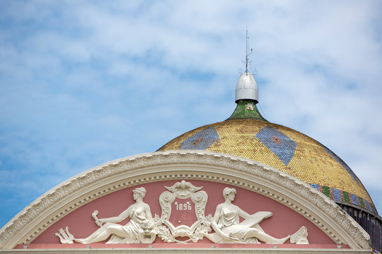 Roof Details from the Amazon Theatre (Portuguese: Teatro Amazonas) with blue cloudy sky, opera house located in Manaus, Amazonas Brazil