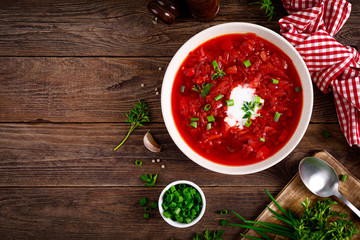 Traditional ukrainian borscht, vegetable soup with tomato, beet, carrot, potato, pepper, cabbage...