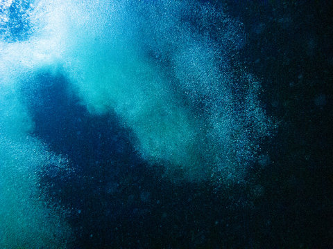 Underwater photography of  splashing bubble.