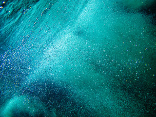 Underwater photography of  splashing bubble.