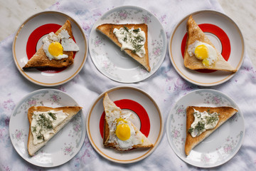Sandwiches with quail eggs and with sour-cream and punch