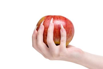 White background close-up apple. More natural nails, concept healthy lifestyle. Caring for the health of hands and nails. Woman Hands Natural Nails, closeup. Beautiful female hand holds an apple. 