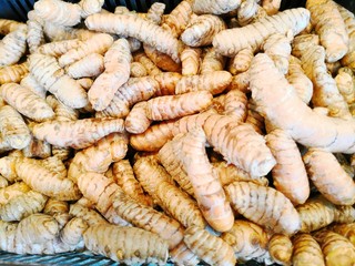 Turmeric  roots full frame background at market