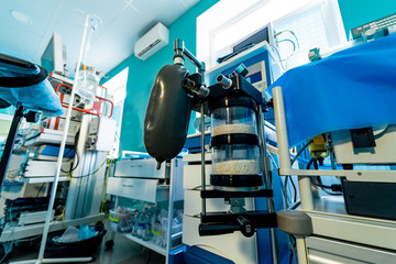 Artificial lung ventilation monitor in the intensive care unit. Nurse with medical equipment. Ventilation of the lungs with oxygen. COVID-19 and coronavirus identification. Pandemic.