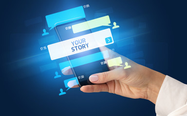 Female hand typing on smartphone with YOUR STORY inscription, social networking concept