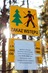 Return of communism in Poland. Information plate with a sign prohibiting entry into the forest. The ban does not comply with the Polish constitution.  PIS violates human rights during the coronavirus 