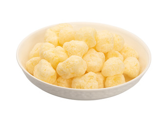 Corn sticks in a plate on a white background.