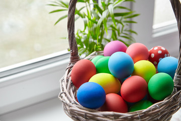 Easter Day, basket with colorful Easter Eggs