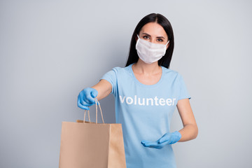 Portrait of her she nice attractive friendly girl voluntary worker job giving sharing parcel...