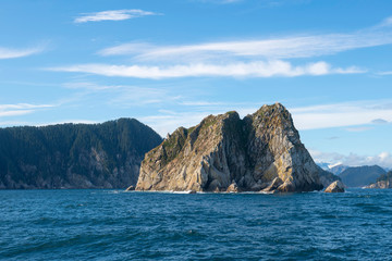 Fototapeta premium An island near Aialik Glacier on Aialik Bay in Kenai Fjords National Park in Sep. 2019 near Seward, Alaska AK, USA.