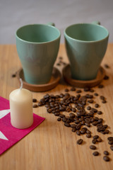 Espresso and coffee beans in background.