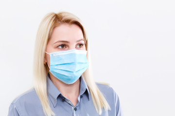 Businesswoman with protecting mask on her lips