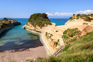 Fototapeta na wymiar The Channel of Love also known as Canal d’amour, the famous beach on the island of Corfu. Greece