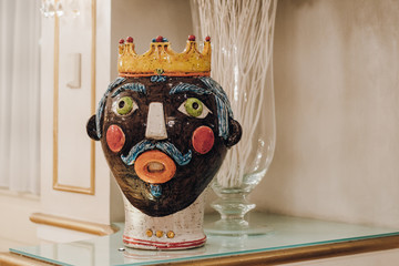 Traditional sicialian vase in form of the head of the prince in crown