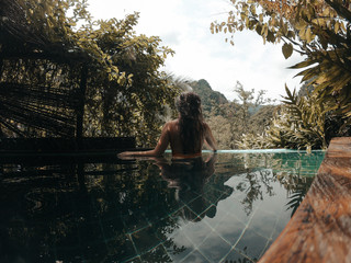 Woman enjoying outdoor pool in Colombia