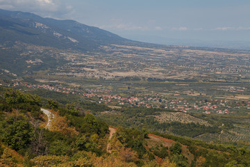 Obraz premium Beautiful aerial view of greek villages along the sea from mountains. Macedonia, Greece.