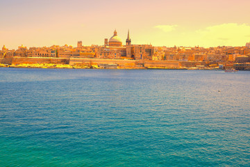 Fototapeta premium Valetta slyline, Malta. Beautiful Mediterranean sea. Morning sunny time.