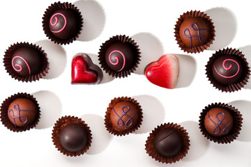 Delicious chocolates on a white background