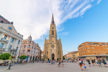 Fototapeta na wymiar Novi Sad, Serbia July 30, 2019: Catholic Cathedral of the virgin Mary at the Central square of the city Novi Sad in Serbia. Freedom Square (serbian: Trg slobode) is the main square in Novi Sad.
