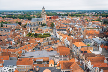 Obraz premium Panoramic view from the Belfort tower on the historic part of Bruges and the Cathedral of St. Salvator, the main pedestrian street with many shops, Belgium. Travel to Belgium.