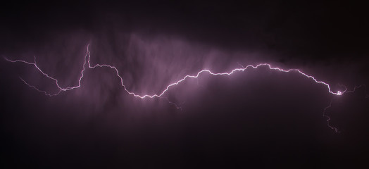 Night sky with various lightning in natural colors