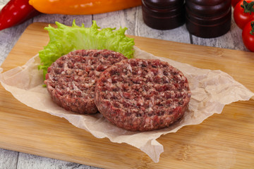 Raw burger cutlet