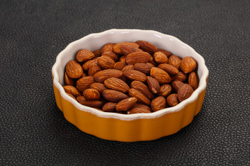 Almonds nuts heap