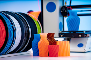 3D Printer Plastic filament for 3D printer and printed products in the interior of the design office