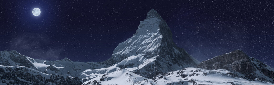 Panoramic View To The Majestic Matterhorn Mountain At Night. Valais, Switzerland