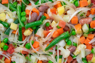 Close up from cooked shredded vegetables. Horizontal orientation. View from above.