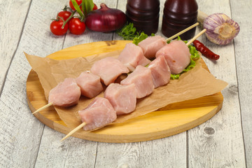 Raw pork meat skewer for grill