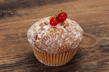 Sweet tasty muffin with red currants