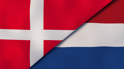 Fototapeta premium The flags of Denmark and Netherlands. News, reportage, business background. 3d illustration